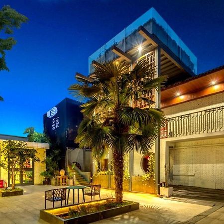 Once Artistic Inn Luoyang Лоян Экстерьер фото