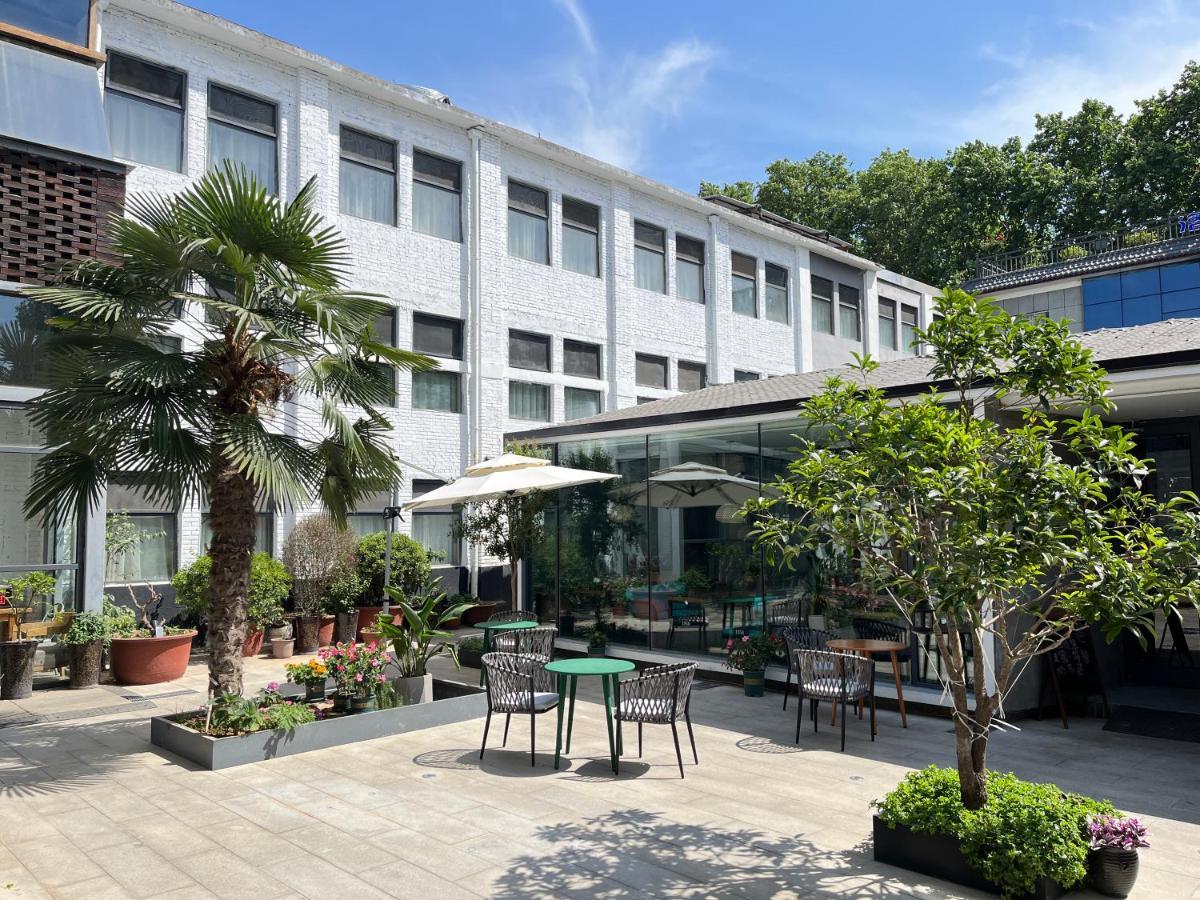 Once Artistic Inn Luoyang Лоян Экстерьер фото