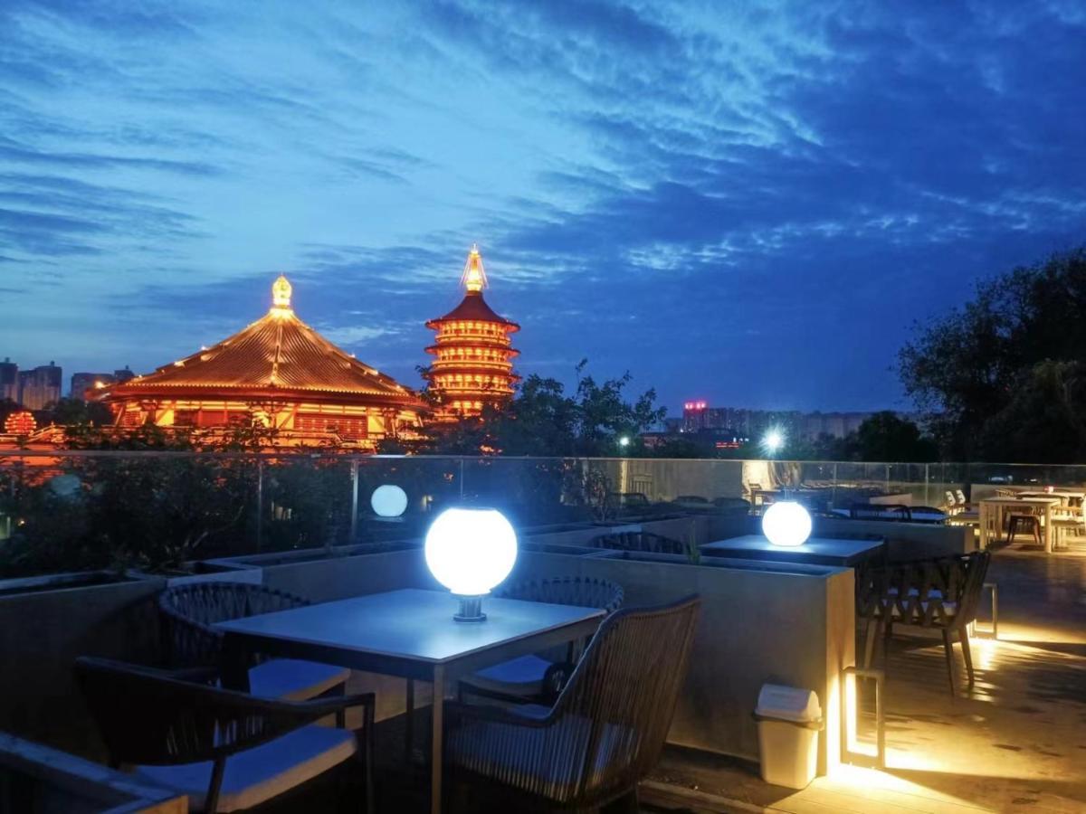 Once Artistic Inn Luoyang Лоян Экстерьер фото