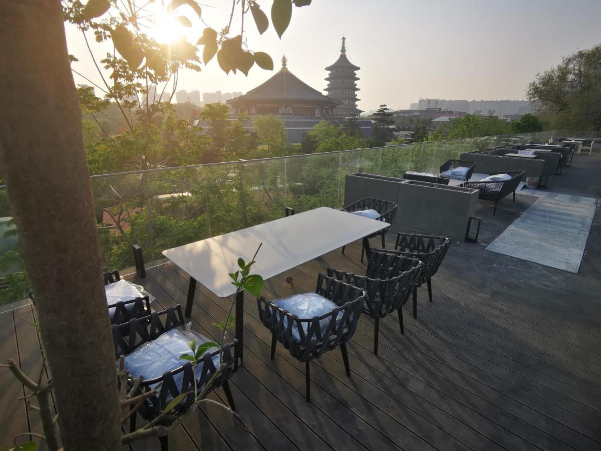 Once Artistic Inn Luoyang Лоян Экстерьер фото