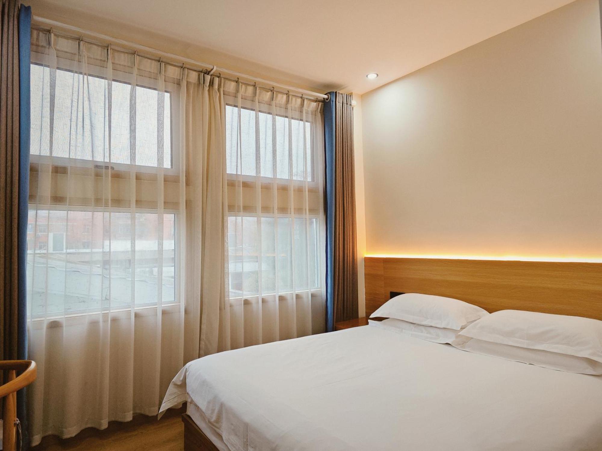 Once Artistic Inn Luoyang Лоян Экстерьер фото