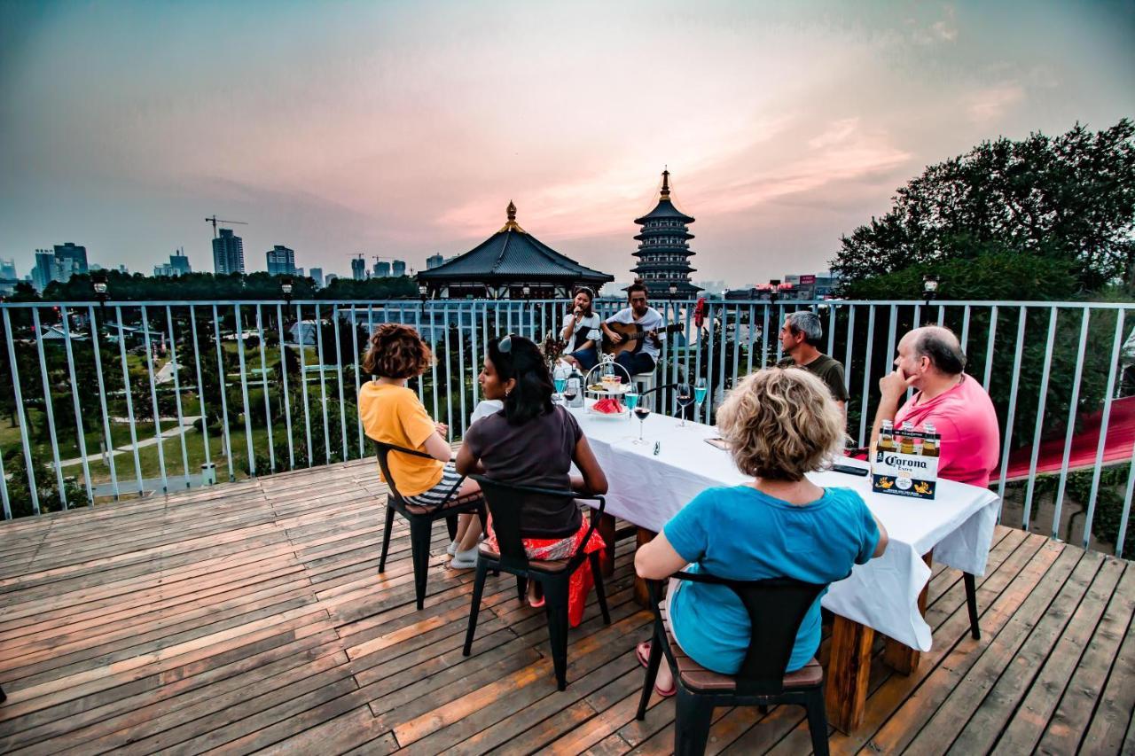 Once Artistic Inn Luoyang Лоян Экстерьер фото